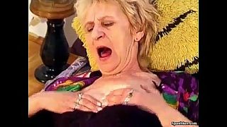 old granny riding cock with a dildo in h